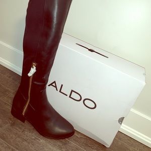 New women’s knee high Aldo boots in size 7.